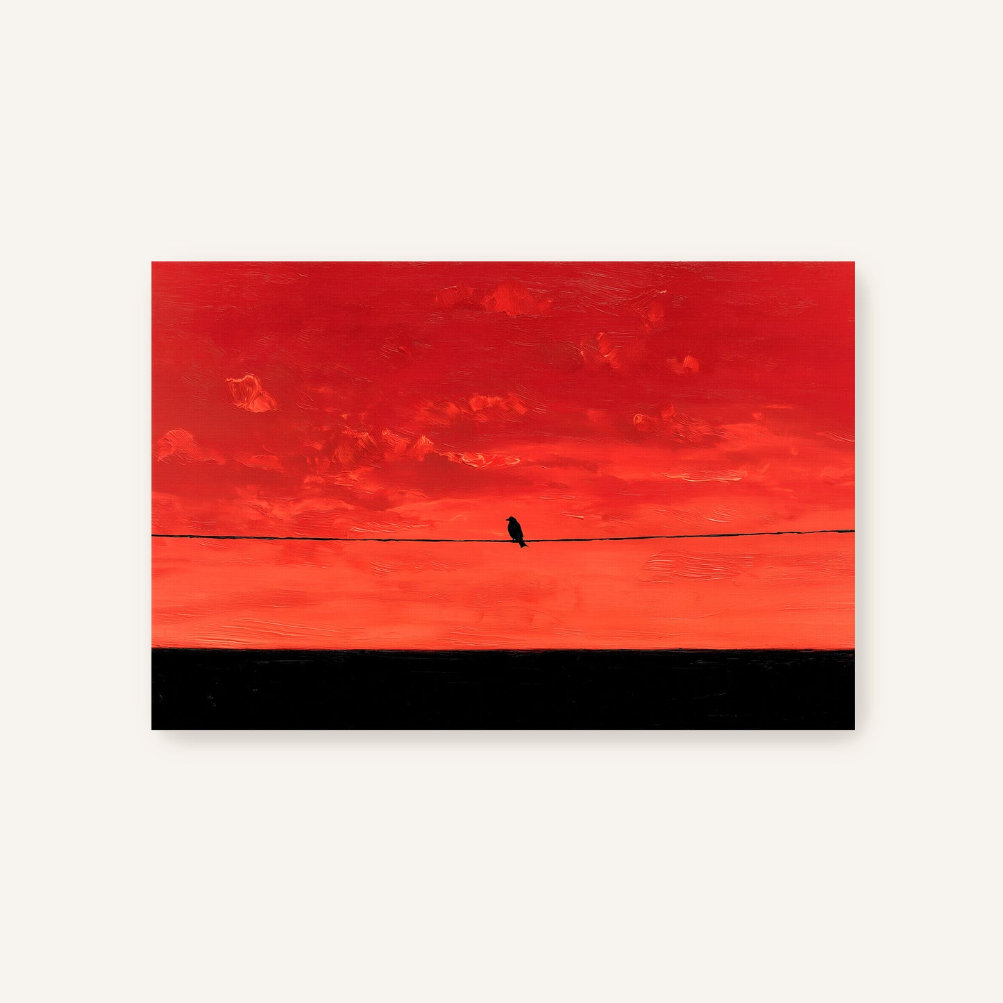 A lone bird perched on a wire against a vibrant red and orange sky.