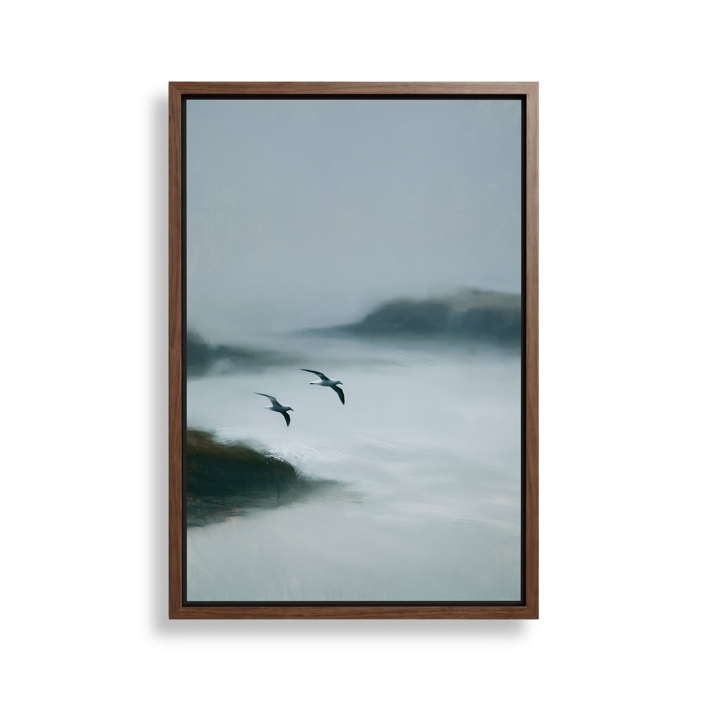 two birds flying over a misty body of water, with a hazy sky in the background.