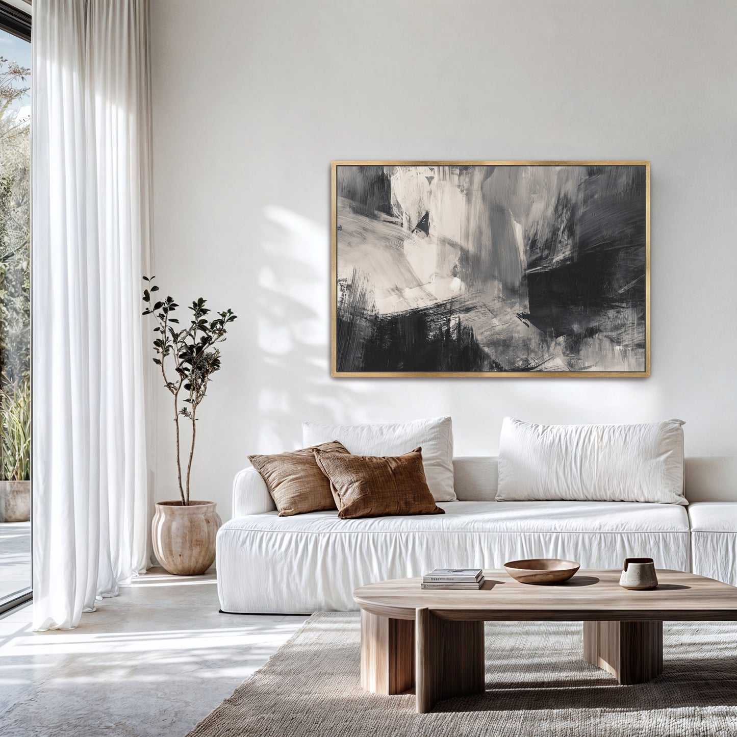 a modern living room with a white sofa, a wooden coffee table, and a large abstract painting on the wall.