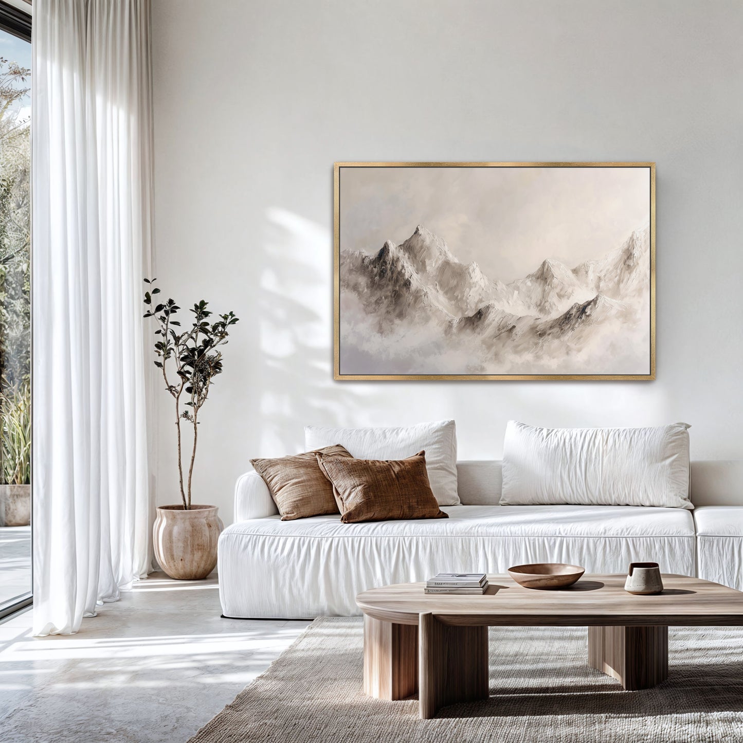 a modern living room with a large white sofa, a wooden coffee table, and a framed landscape painting hanging on the wall.