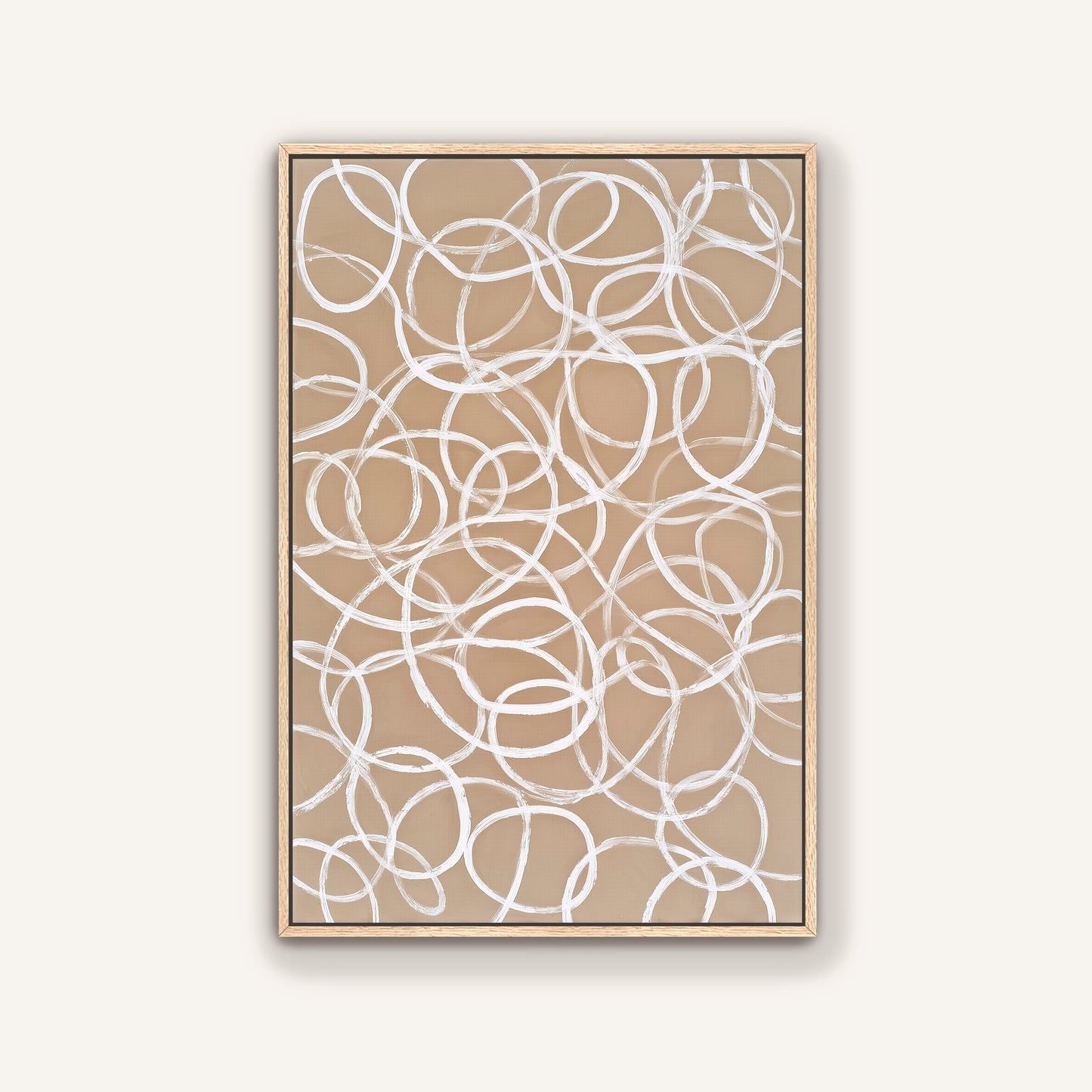 a square-shaped frame with a repeating pattern of white circles on a beige background.