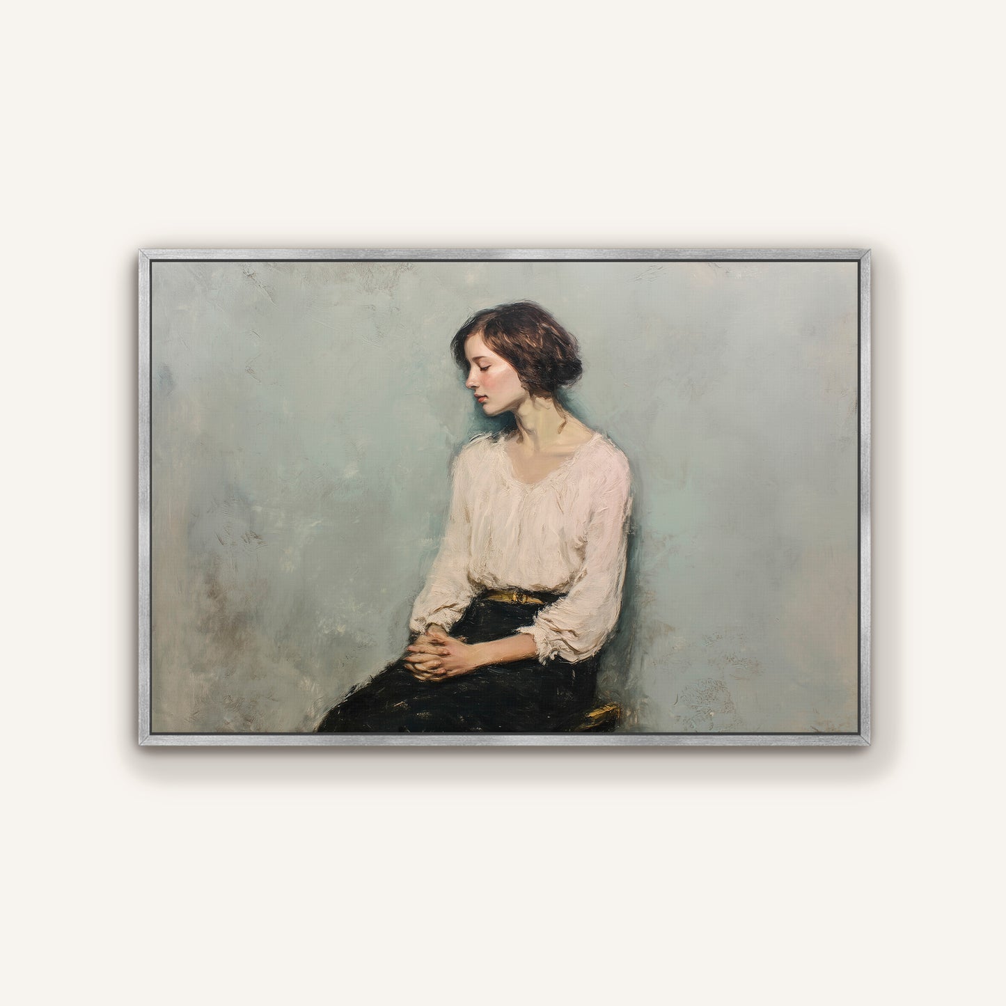 Seated woman portrait framed in brushed silver, timeless art print with muted colors on a light background.