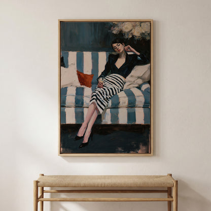 The image is a framed painting depicting a woman in a black and white striped dress sitting on a striped couch, with a red pillow on the couch.