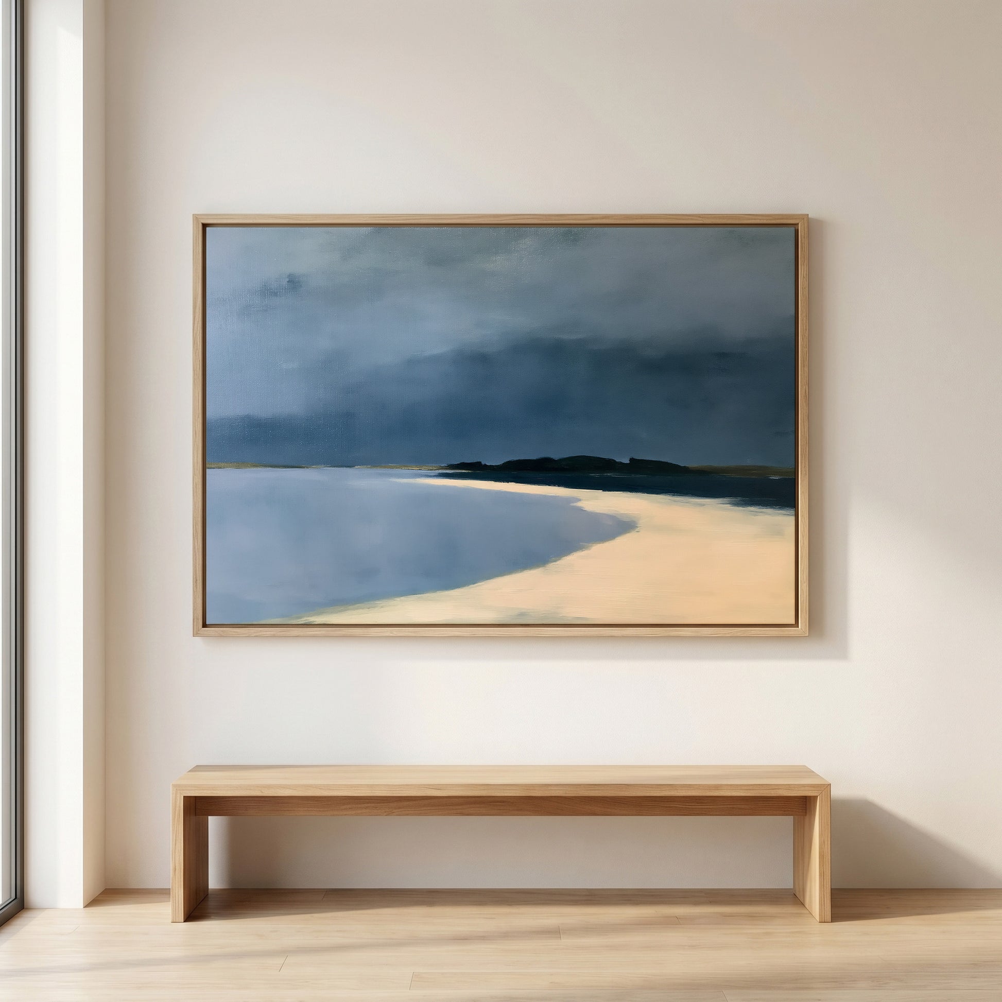 a large painting of a beach scene hanging on a wall above a wooden bench.