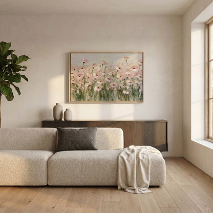a serene living room with a large window, a beige sofa, a wooden cabinet, and a framed painting of pink flowers on the wall.