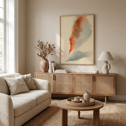 a cozy living room with a beige sofa, a wooden sideboard, and a large abstract painting on the wall.