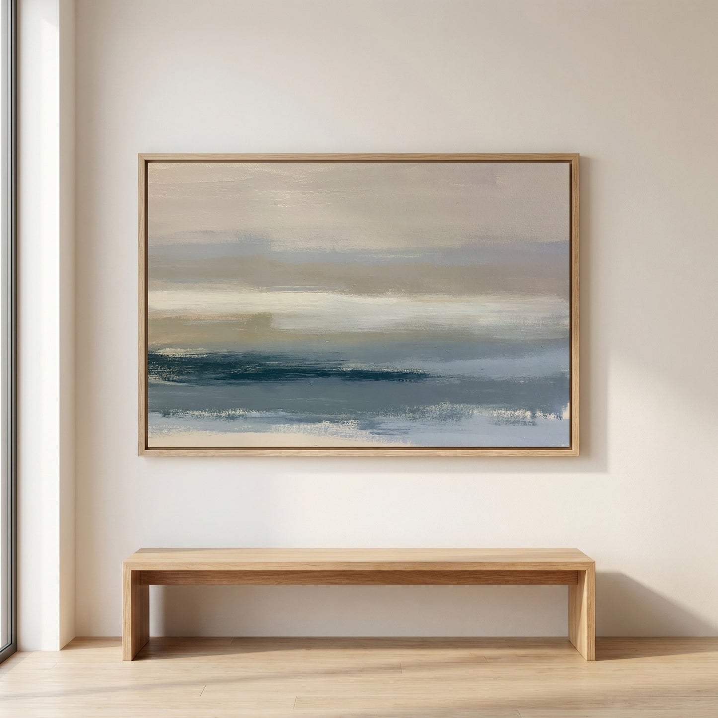 a large, abstract painting hanging on a white wall above a wooden bench.