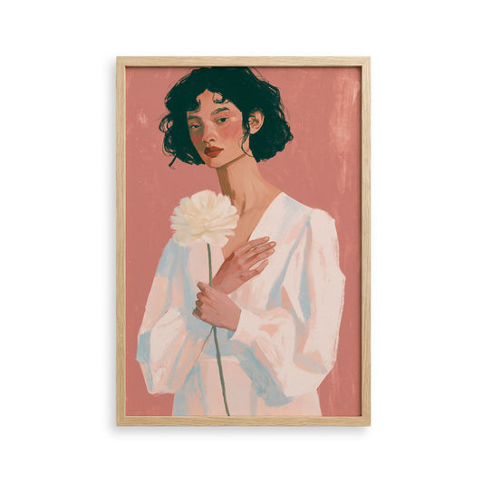 A woman with dark hair is holding a large white flower in the image.