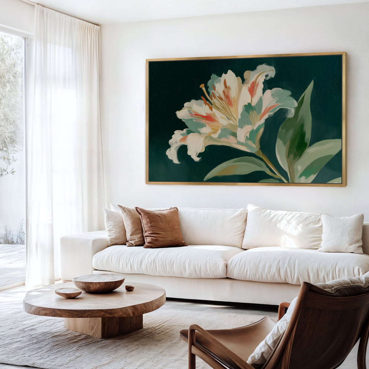 a living room with a large, colorful painting of a lily flower hanging on the wall above a white sofa. The room has a wooden coffee table in front of the sofa, and a brown leather chair is placed nearby.