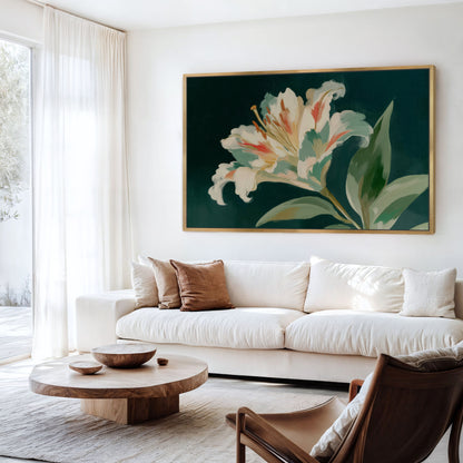 a living room with a large, colorful painting of a lily flower hanging on the wall above a white sofa. The room has a wooden coffee table in front of the sofa, and a brown leather chair is placed nearby.