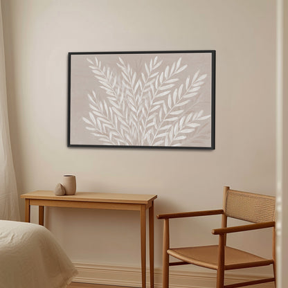 Minimalist Whisper canvas print with ivory botanical leaves on taupe background in black frame, perfect for modern interiors