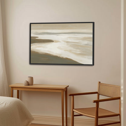 Emie canvas print coastal landscape with beige, ivory, olive tones in black frame above wooden desk and chair