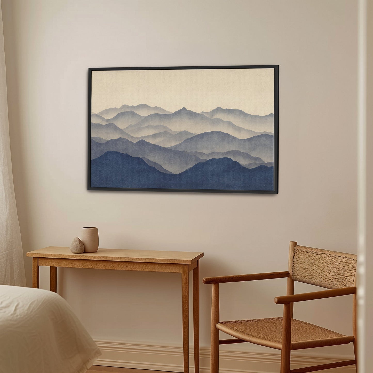 Veil Canvas Print of layered mountain silhouettes in indigo and beige tones hanging in minimalist room