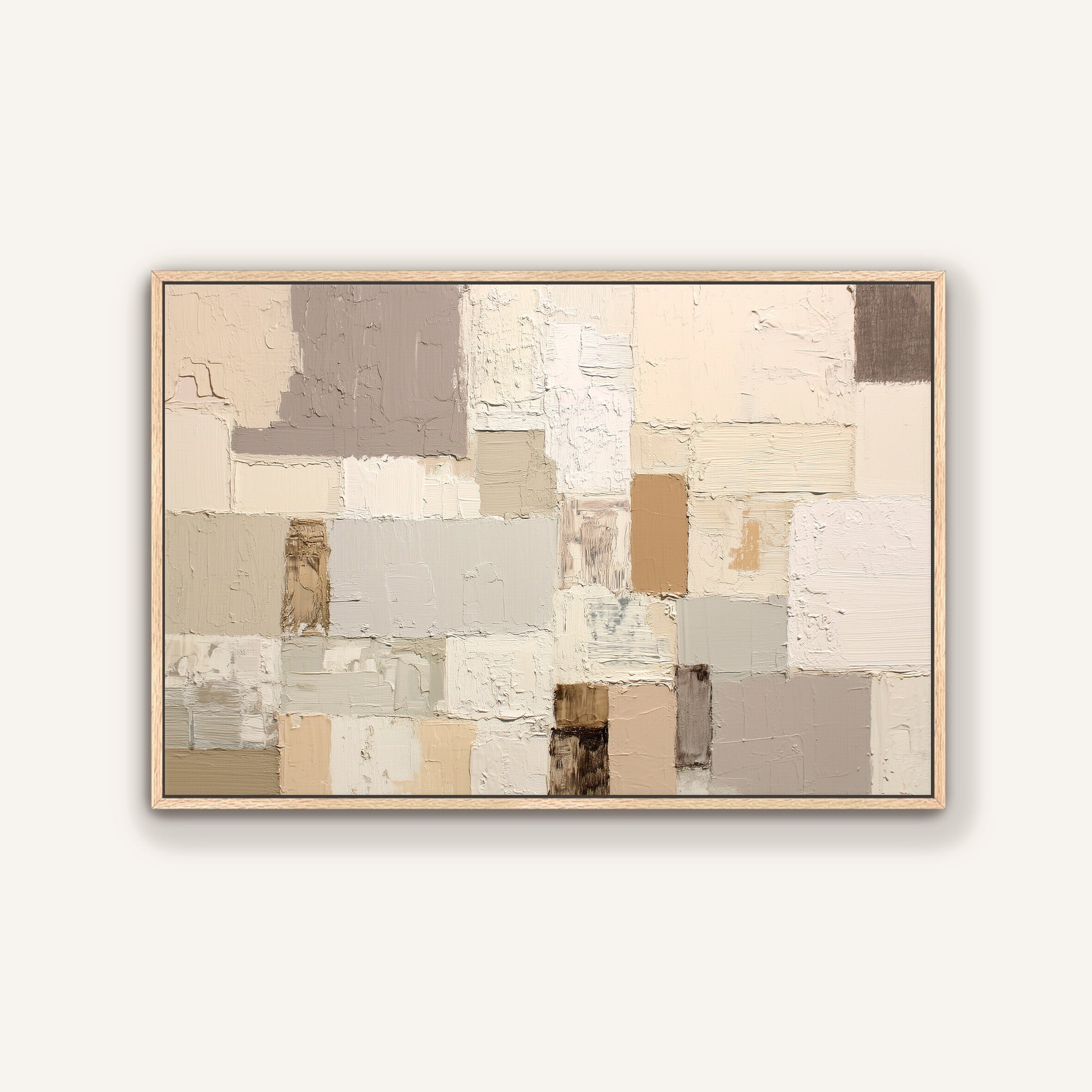 The image is a large abstract painting with a variety of colors and textures, including shades of gray, beige, and brown. The painting is framed and displayed on a wall.