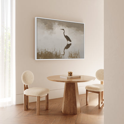 Wade Canvas Print of a heron standing in calm water with muted earth tones in a modern neutral dining room.
