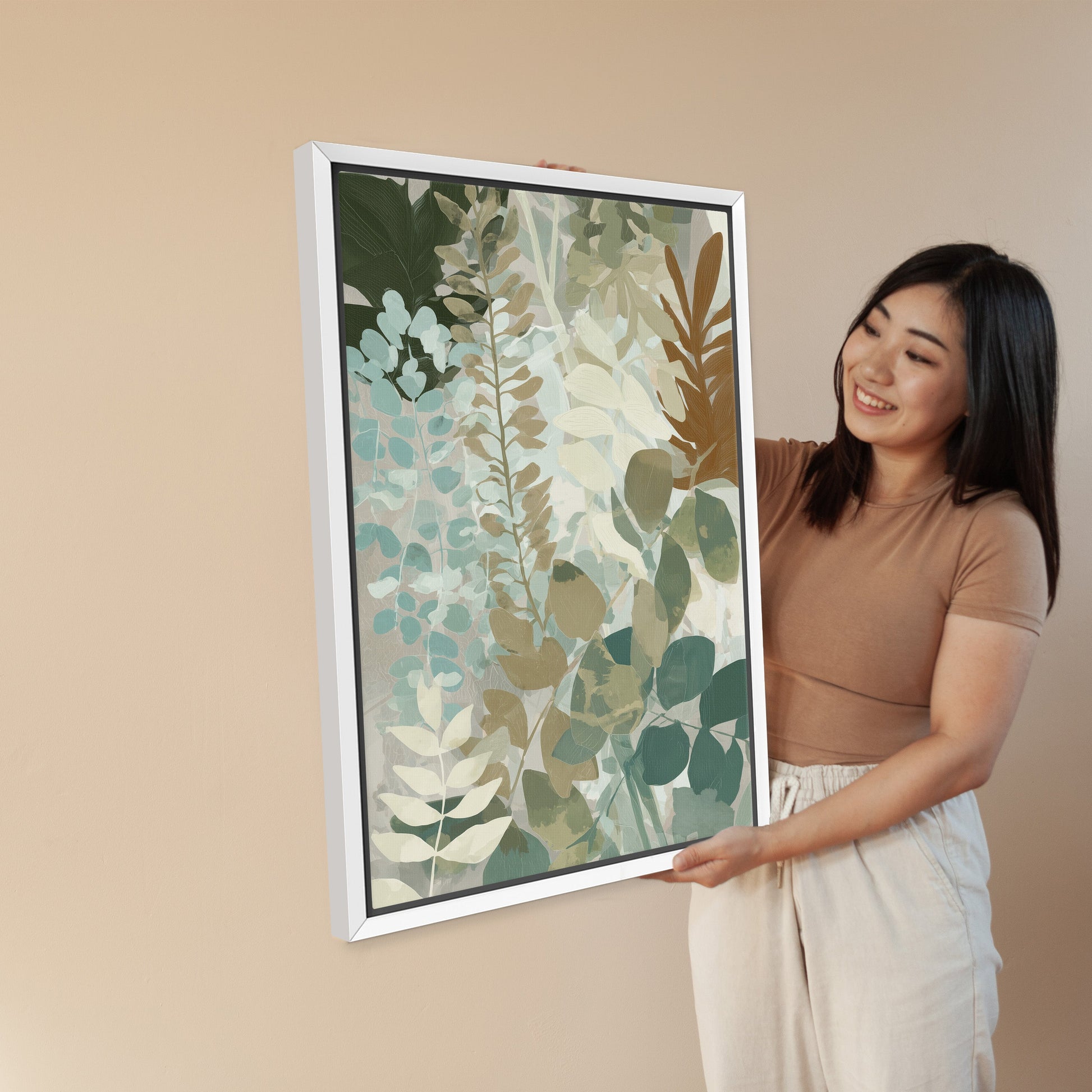 Herba Canvas Print with soft botanical forms in sage, sea-green, and beige tones in a white frame