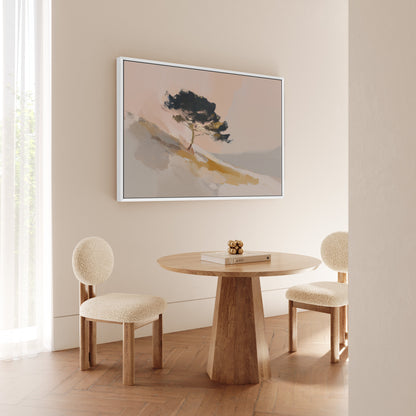 Arbor canvas wall art featuring a lone pine tree on a sunlit hillside in warm neutral tones, framed in white, hung in a modern minimalist dining room.