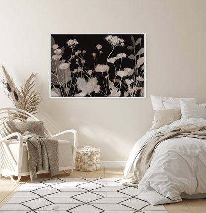 Shadow Bloom Canvas Art featuring neutral wildflowers on black background in a minimalist bedroom setting