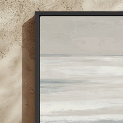 Framed Syd canvas print featuring soft ivory, sand, and indigo coastal abstract art in a black solid wood frame