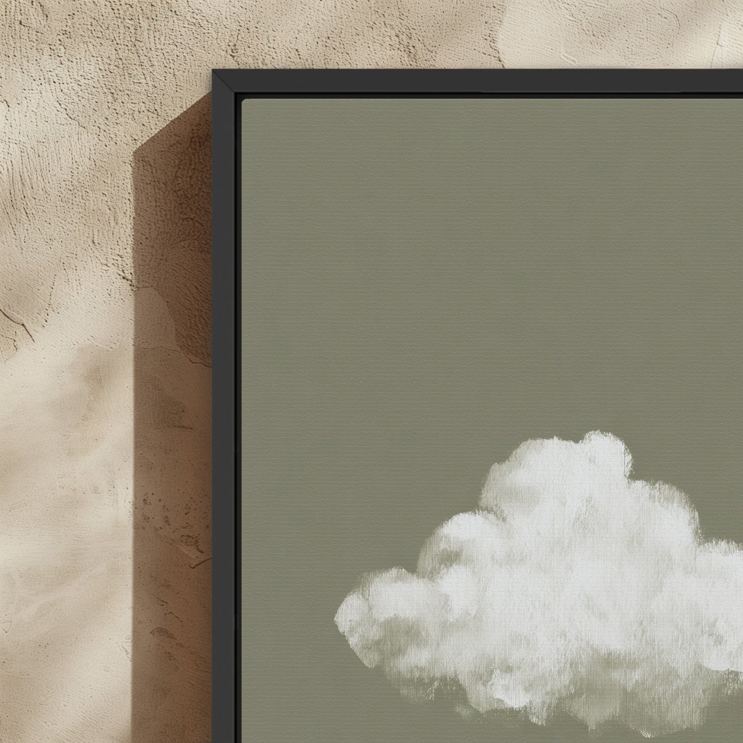 'Trace' canvas print featuring a single white cloud on a muted sage background with a black frame