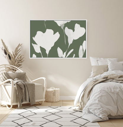 Verdal canvas print with ivory floral silhouettes on muted olive background in modern neutral bedroom setting