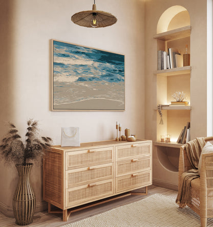 Marin Canvas Print of blue and neutral shoreline waves in a minimalist beige room with wooden furniture and natural decor