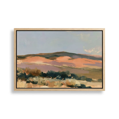 The image is a landscape painting depicting a serene desert scene with rolling hills, sparse vegetation, and a clear blue sky.