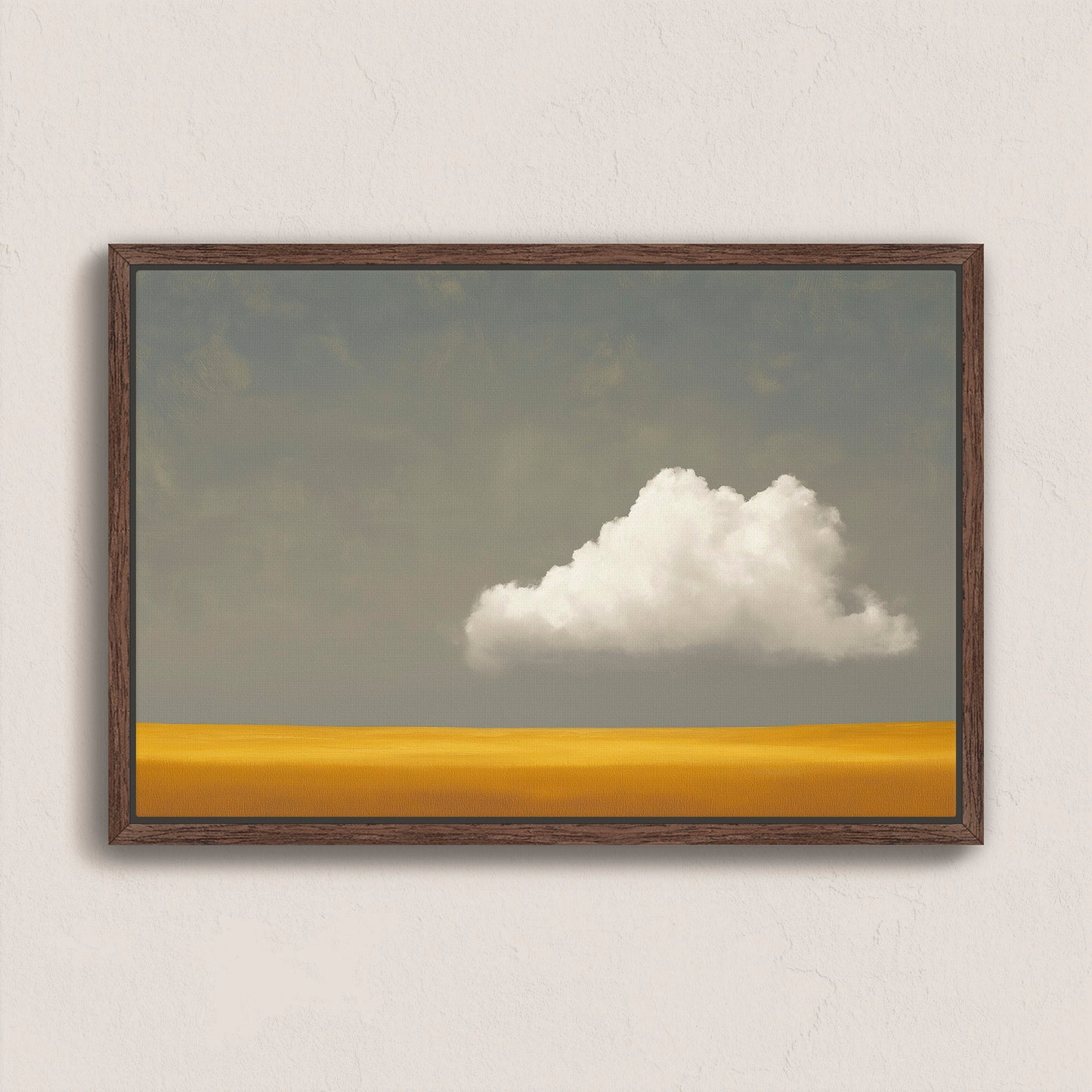 Mellow Canvas Print featuring a white cloud above a golden plain with a muted gray sky, framed in dark wood, minimalist wall art for modern interiors