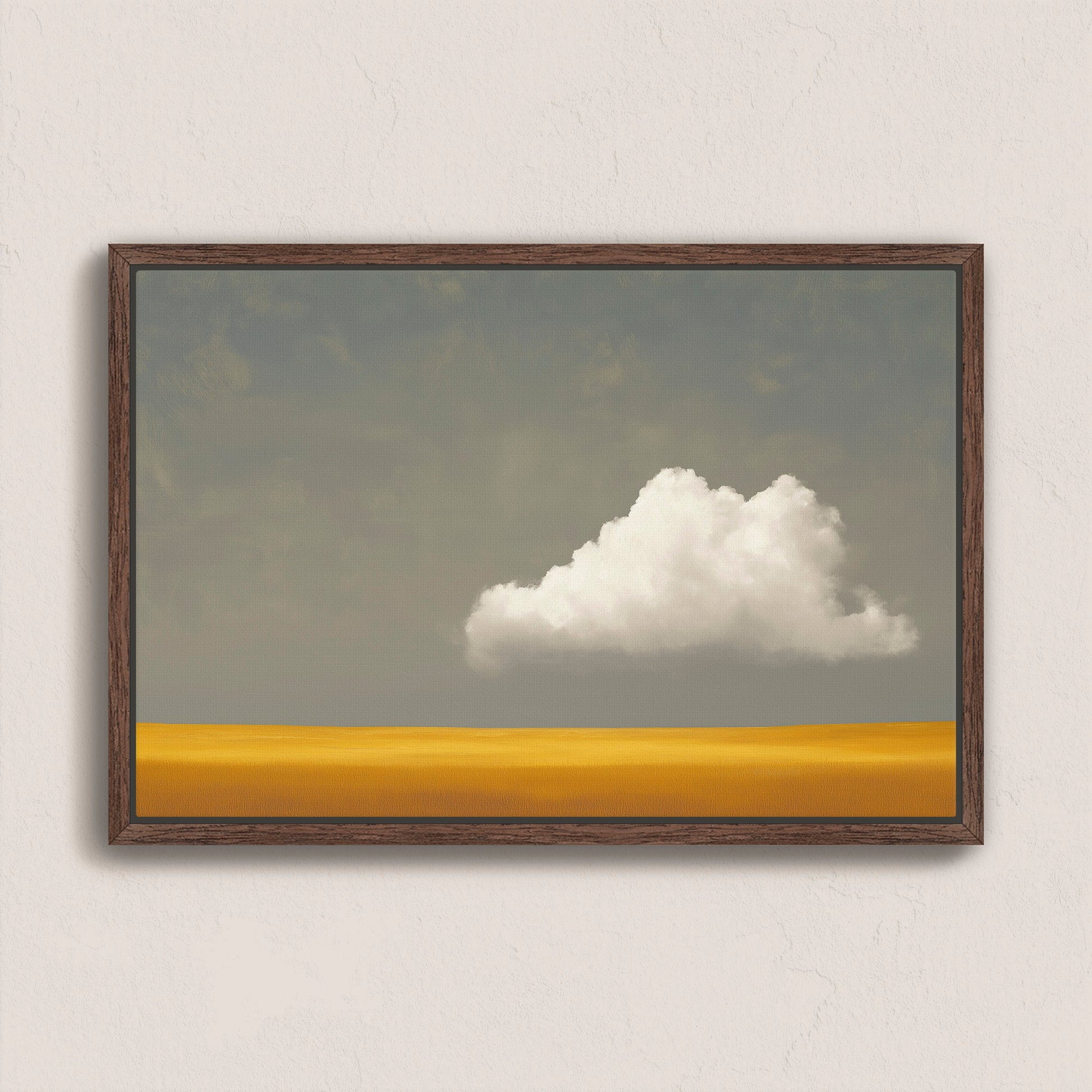 Mellow Canvas Print featuring a white cloud above a golden plain with a muted gray sky, framed in dark wood, minimalist wall art for modern interiors