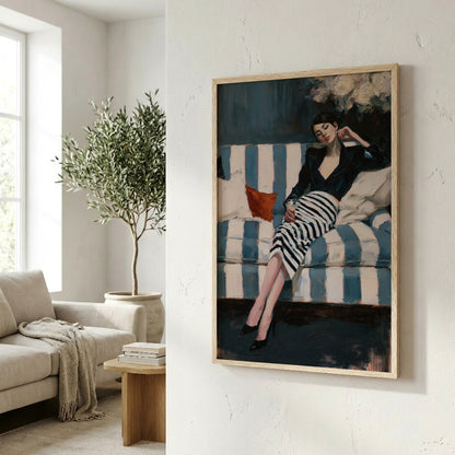 a framed painting of a woman sitting on a striped couch, with a potted plant and a stack of books visible in the background.