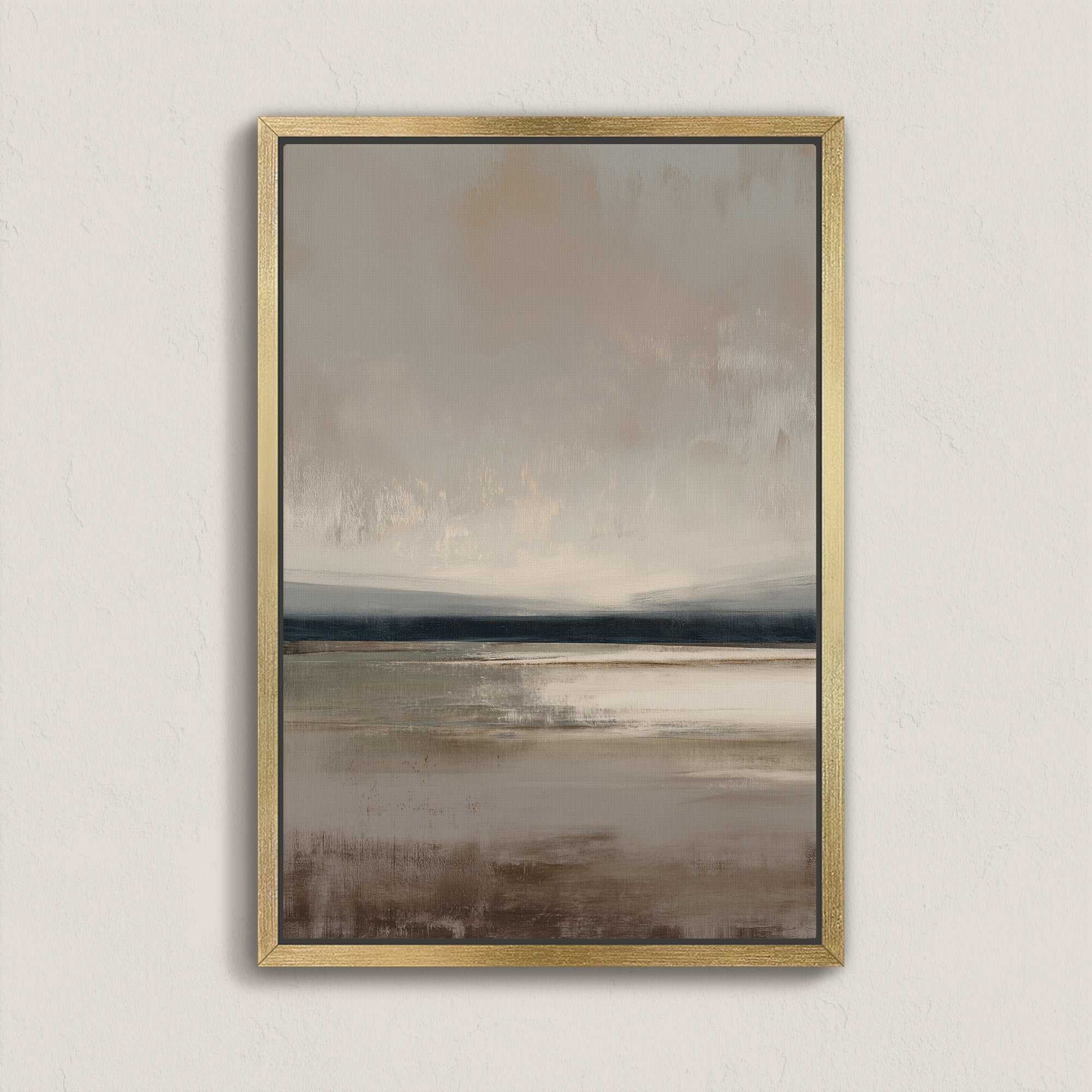 Vast canvas art with soft taupe, charcoal, and cream gradients in a gold frame showcasing a serene landscape horizon.