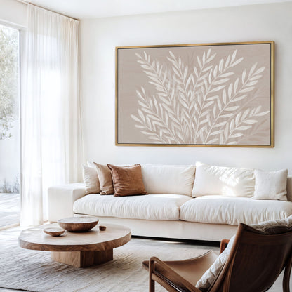 Whisper canvas print with ivory leaves on taupe background in modern living room