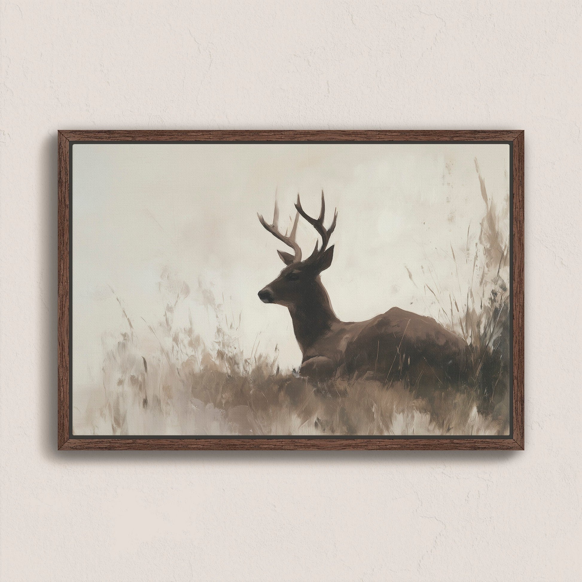 Haven Canvas Print featuring a resting deer in soft grasses with a neutral color palette and warm tones in a walnut frame