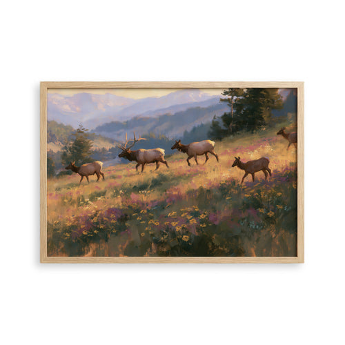 A group of elk walking through a field of wildflowers, with mountains in the background.