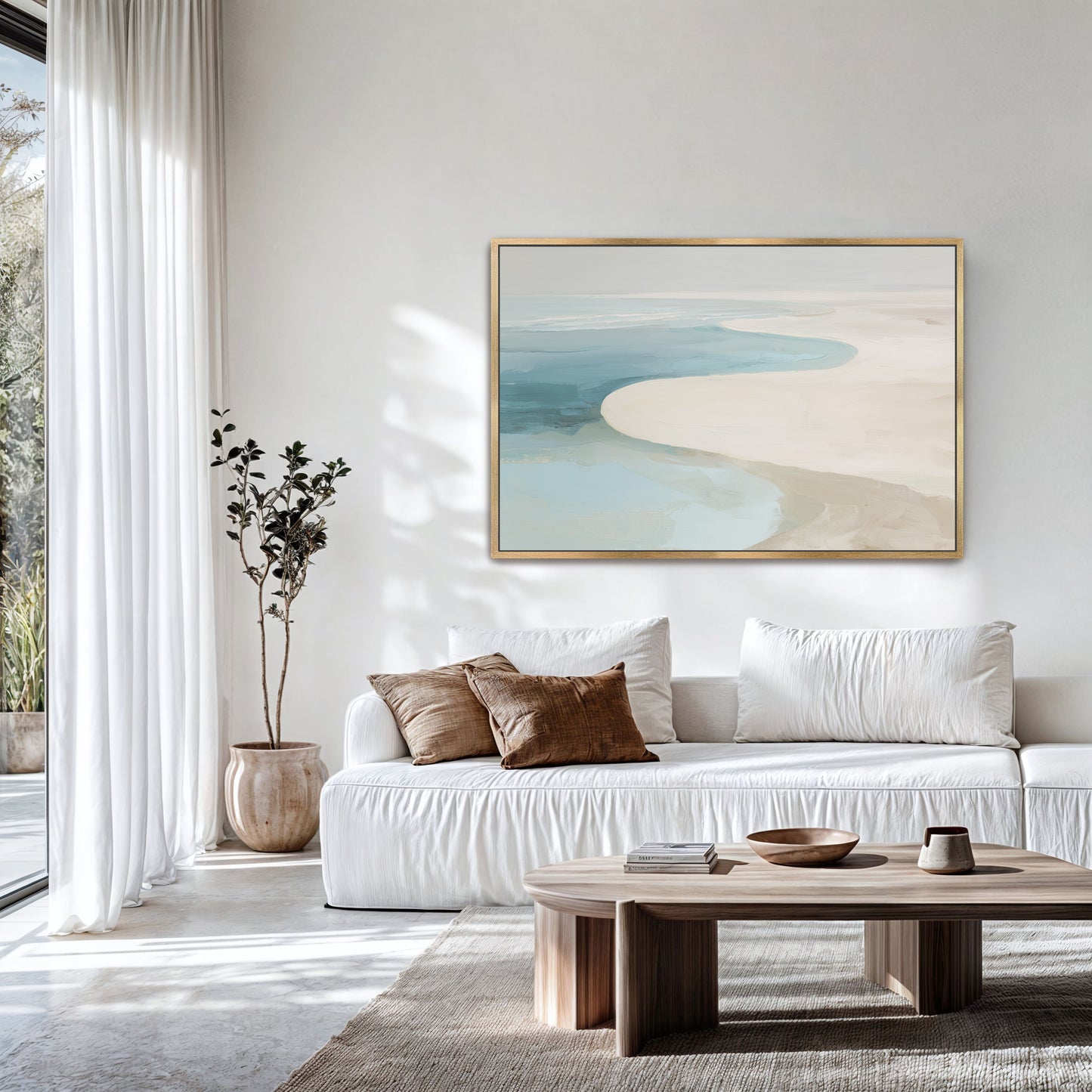 Tideway Canvas Wall Art showing serene coastal abstract in beige and blue above white sofa in modern living room