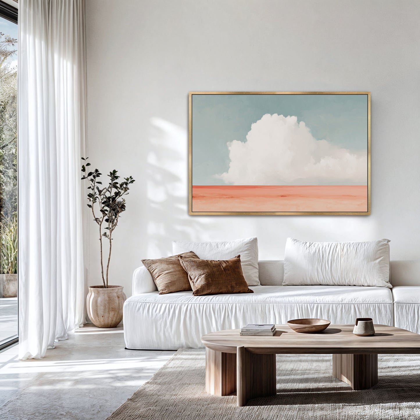 Aurea Canvas Wall Art featuring a lone white cloud over coral desert horizon in minimalist living room