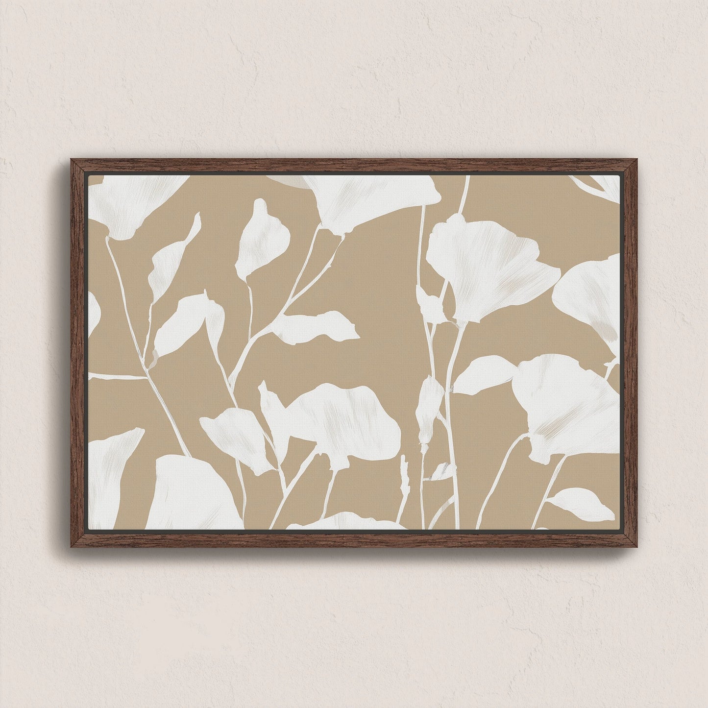 Driftleaf canvas print with white floral silhouettes on beige background in a dark wood frame
