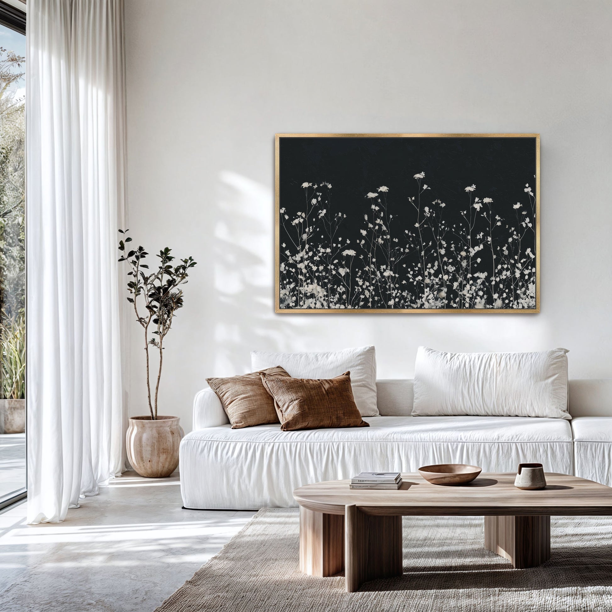Noiré Canvas Wall Art with delicate white florals on deep charcoal backdrop in modern living room