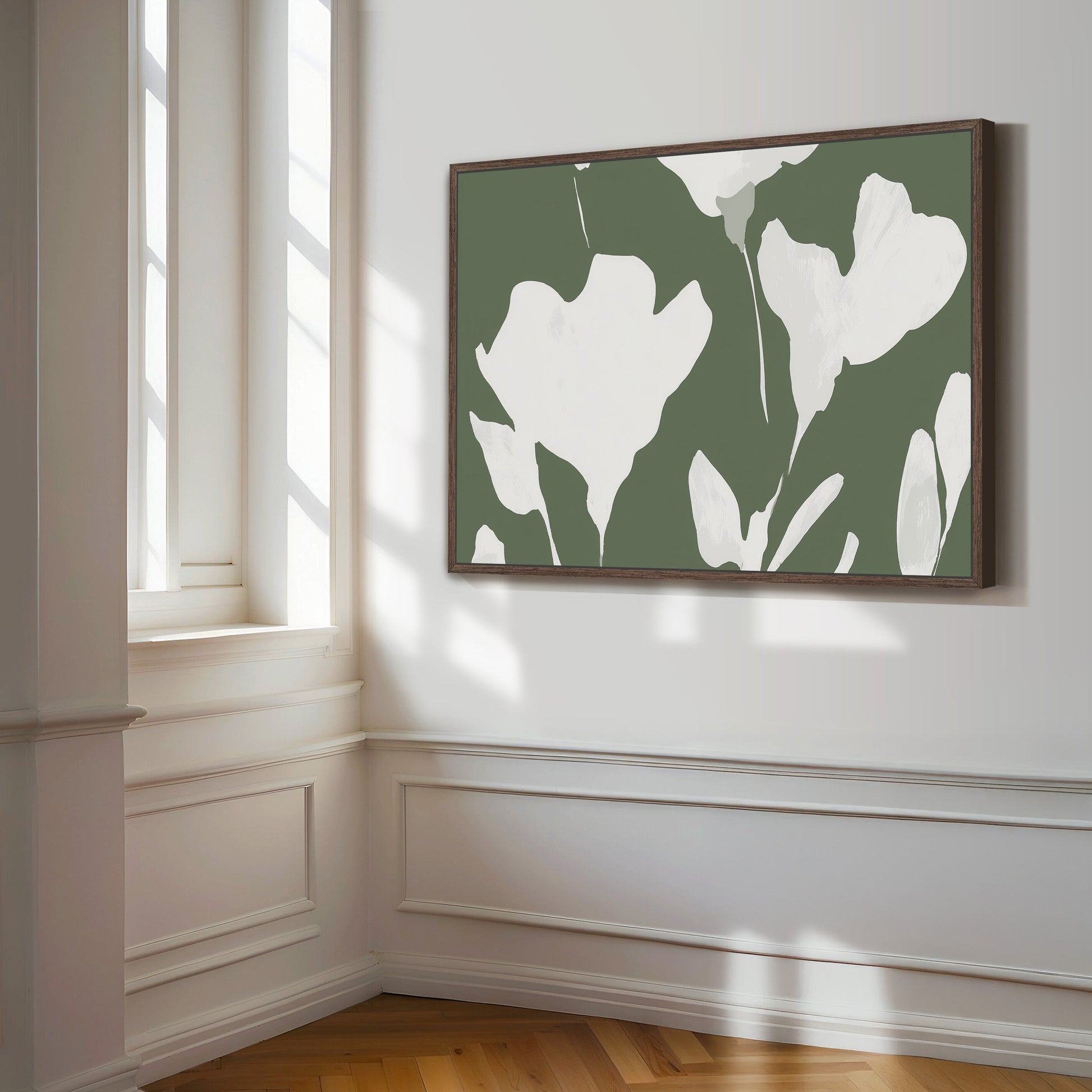 Verdal Canvas Print featuring ivory floral silhouettes on muted olive background in a modern minimalist frame hanging in bright room