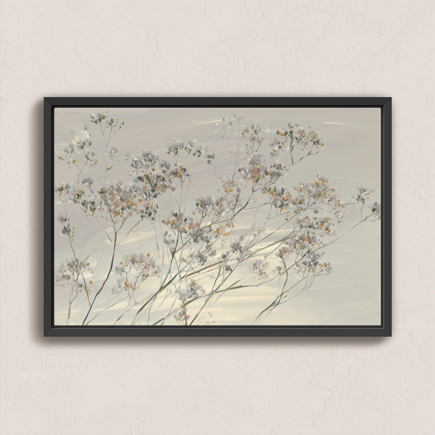 'Breeze' Wall Art canvas featuring delicate wildflowers in muted tones with black frame on neutral wall