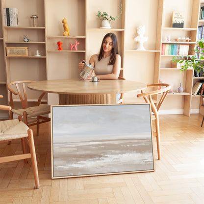 Minimalist 'Barren' canvas print featuring calm taupe, cream, and sand layers in a modern living space