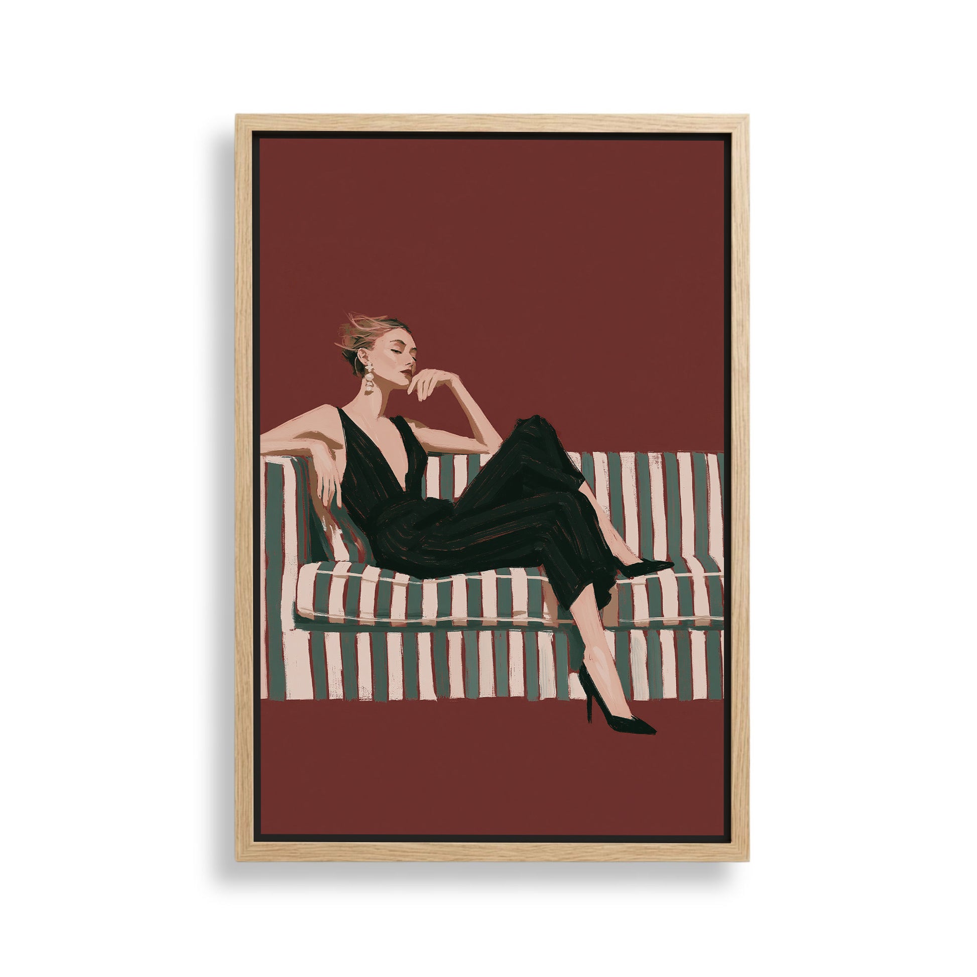 A woman in a black jumpsuit is sitting on a striped couch against a red background.