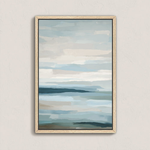 Lapse canvas print of abstract sea and sky in soft blue, ivory, and sand tones with natural wood frame.