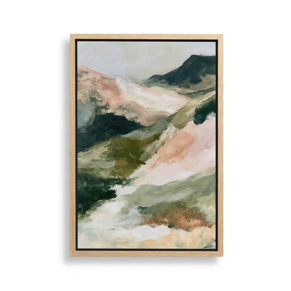 The image is a framed abstract landscape painting depicting a mountainous, mountainous terrain with a mix of green, pink, and brown colors.