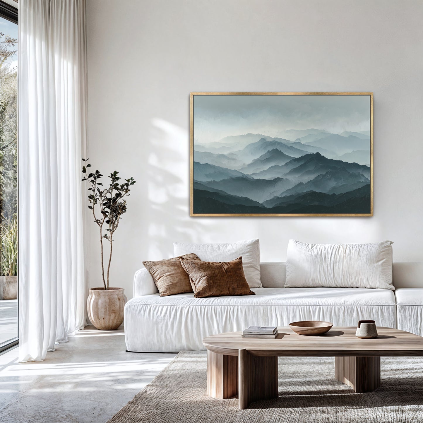 a serene living room with a large painting of a mountain landscape hanging on the wall. The room is decorated with a white sofa, a wooden coffee table, and a potted plant. The overall atmosphere of the room is calm and inviting, with the natural elements of the painting and the indoor plants contributing to the peaceful ambiance.