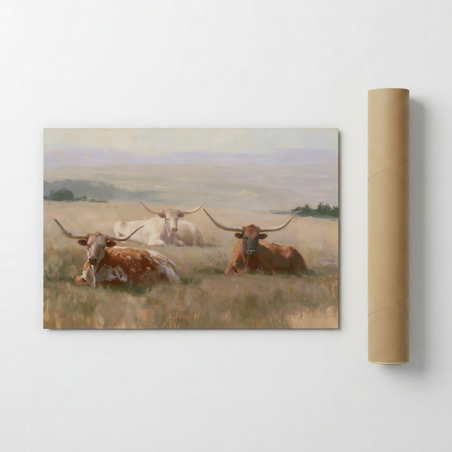 a group of three longhorn cattle resting in a grassy field.