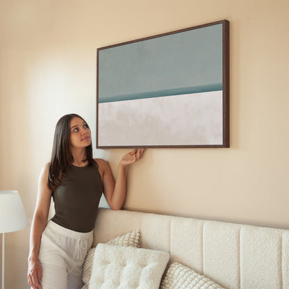 Azure Canvas Print minimalist sea and sky art in muted sage and sand hues on wall with wooden frame