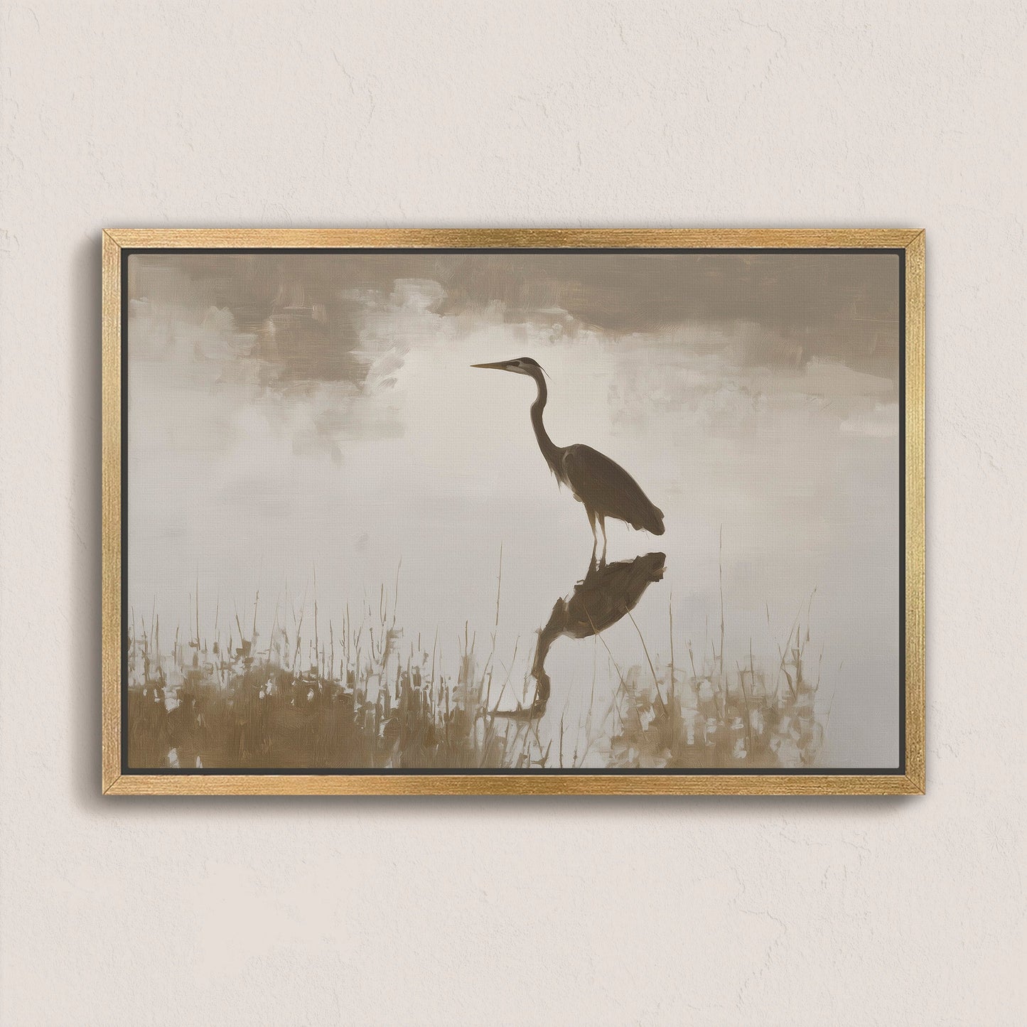 Wade canvas print of a heron standing in calm water with muted earth tones and gold frame
