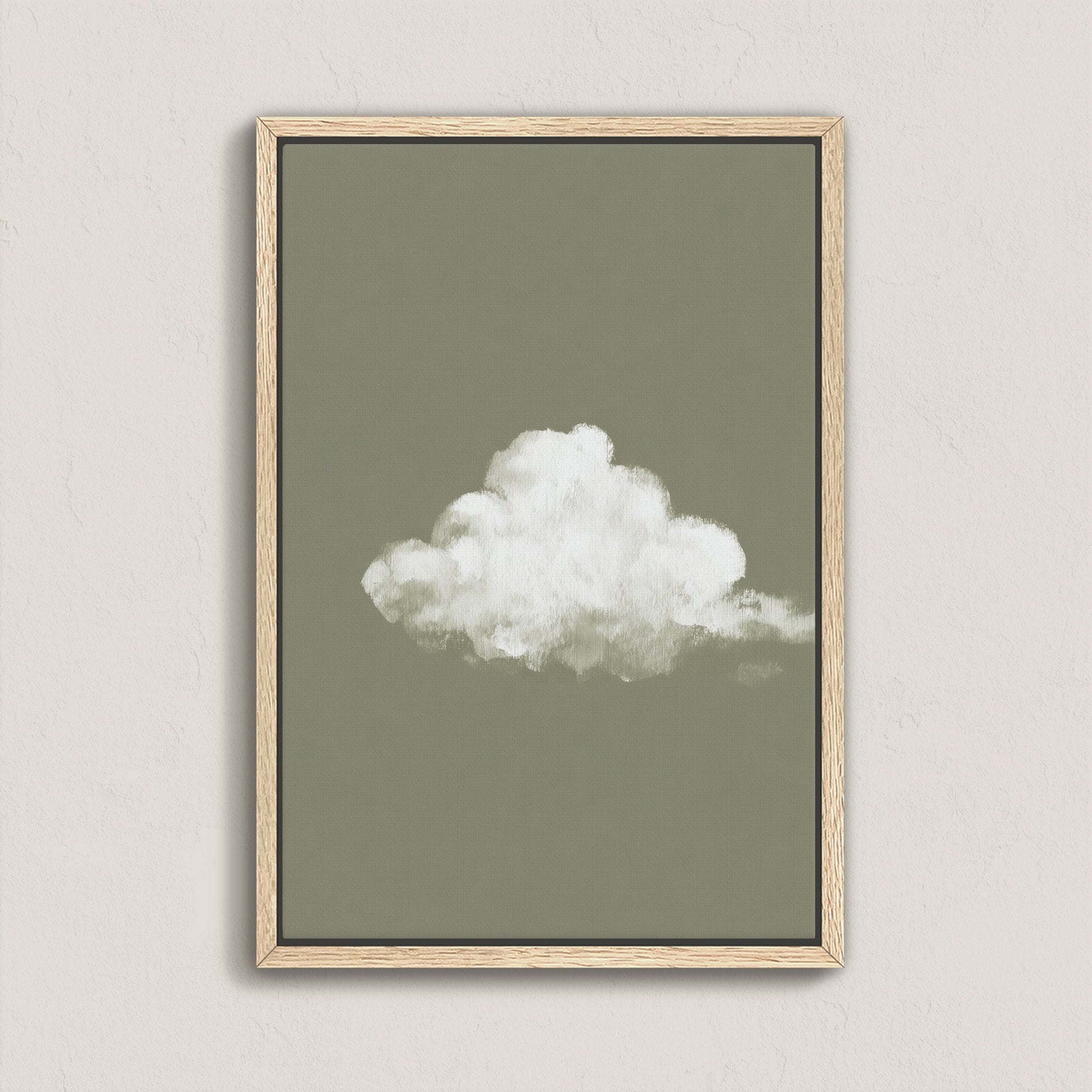 'Trace' Canvas Print featuring a single white cloud on a muted sage background in a natural wood frame