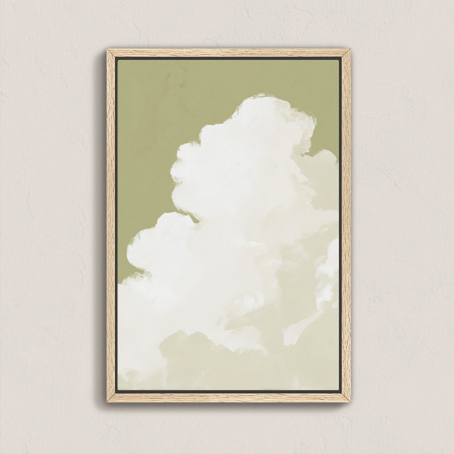 'Rise' canvas wall art featuring a soft white cloud ascending against muted sage background in a natural wood frame